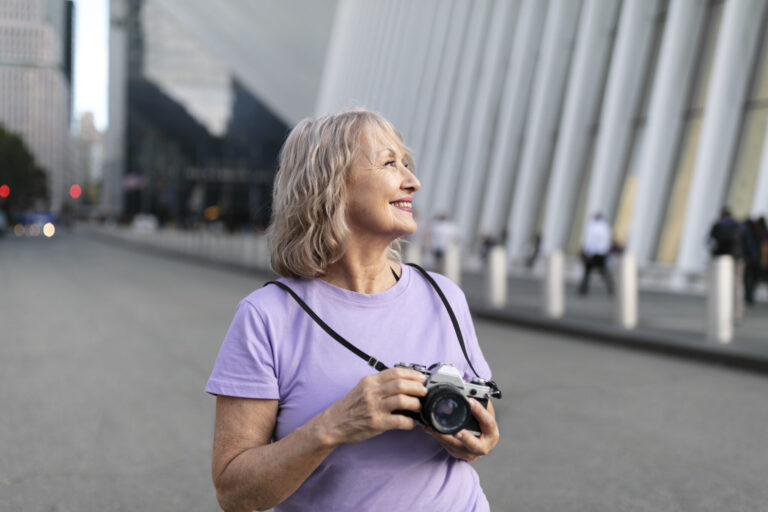 senior woman traveling areound world scaled