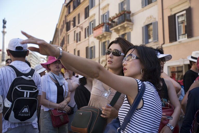 1280px Two Japanese tourists visiting in Piazza Spagna Rome 2404