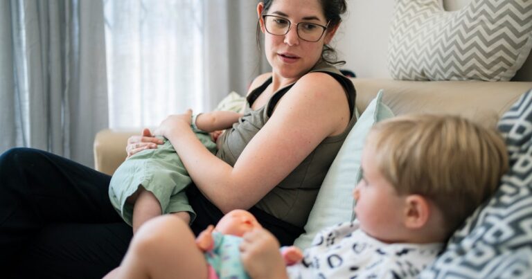 mother breastfeeding her baby